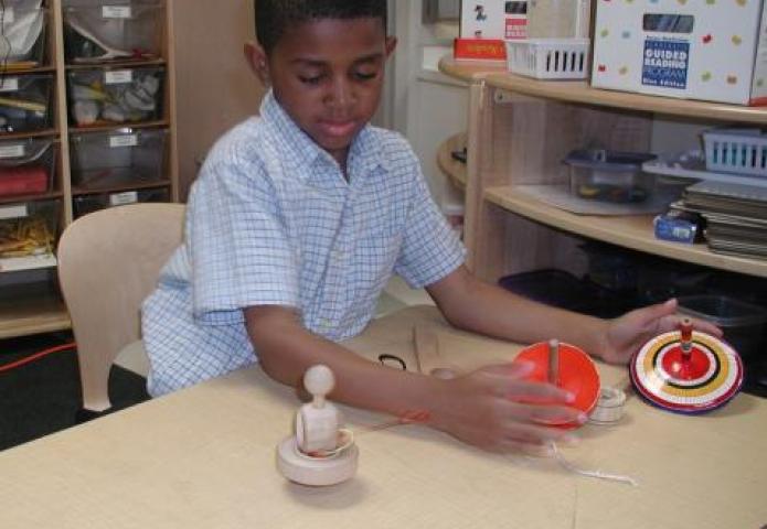 Child playing with a spinner.