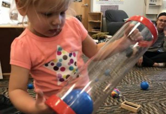 Playing with a tube.