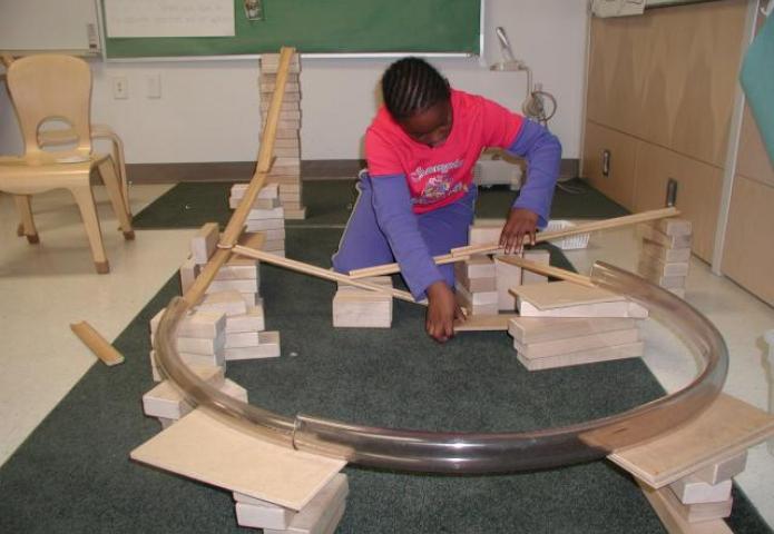 Child creating a ramp.