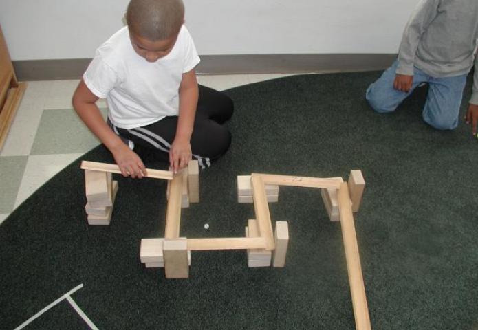 Child with a zig-zag ramp.