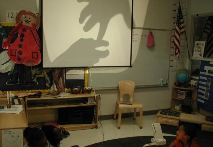 Shadows on a classroom wall.