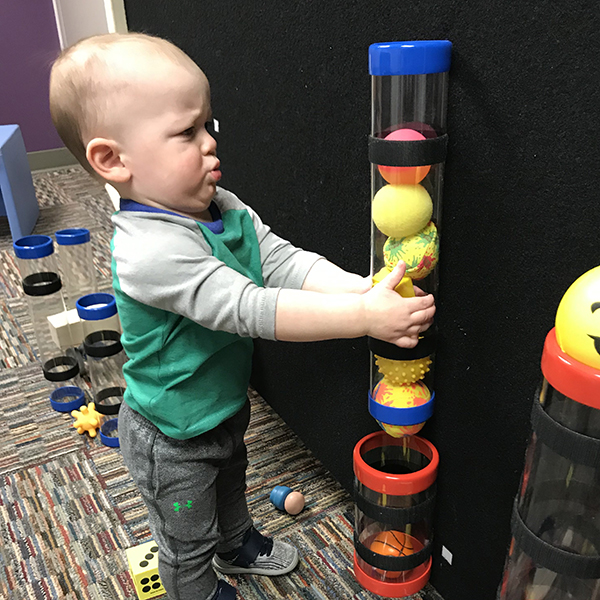 Boy with a ball holder.