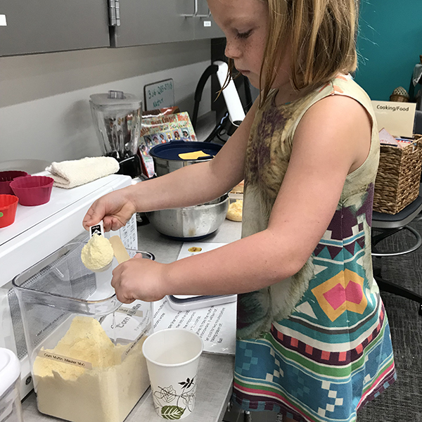 Girl making food.