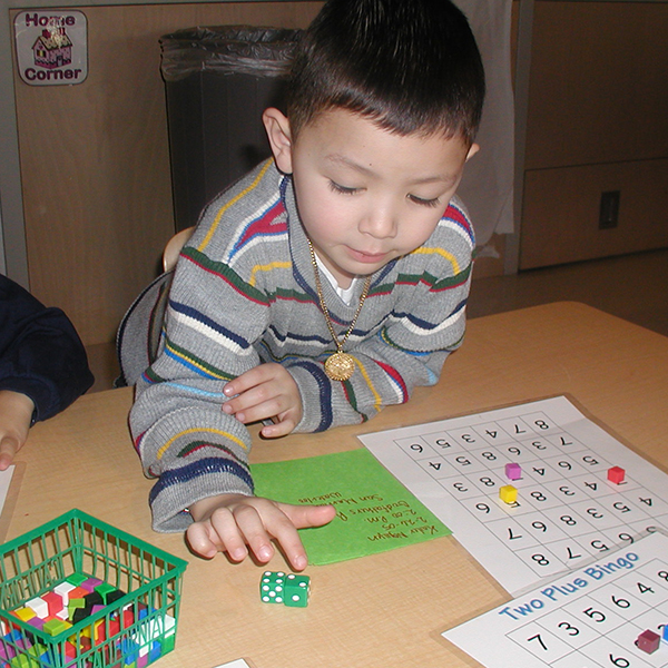 Child playing board games.