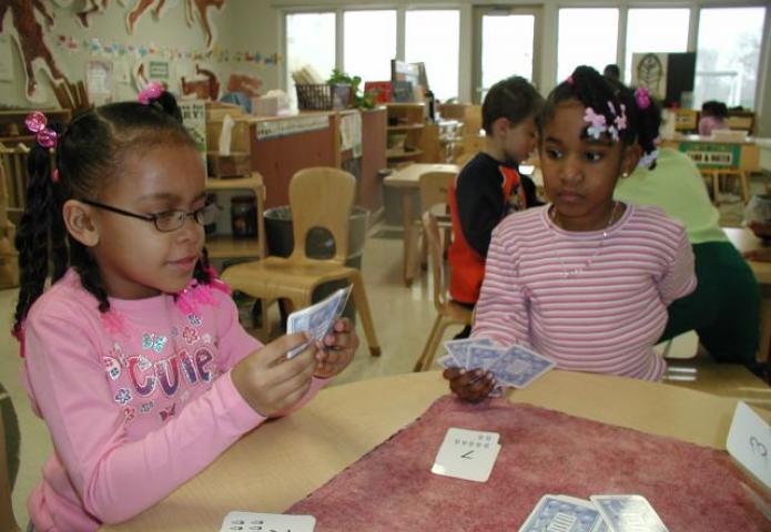 Students playing cards.