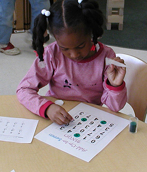 Child solving a puzzle.