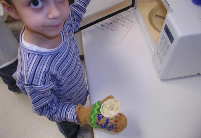 Student tasting food.