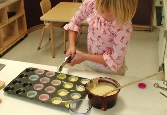 Pouring cup cakes.