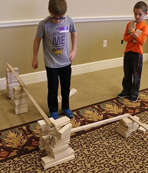 Kids playing with ramps.