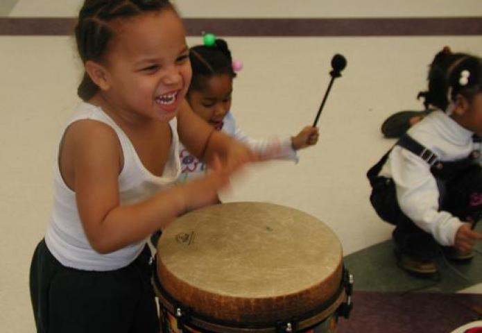 Children playing percussion.