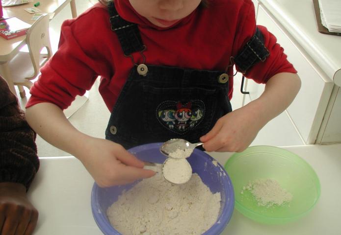 Mixing flour.