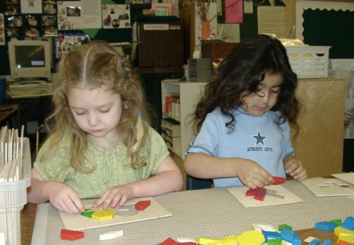 Children playing at a table.