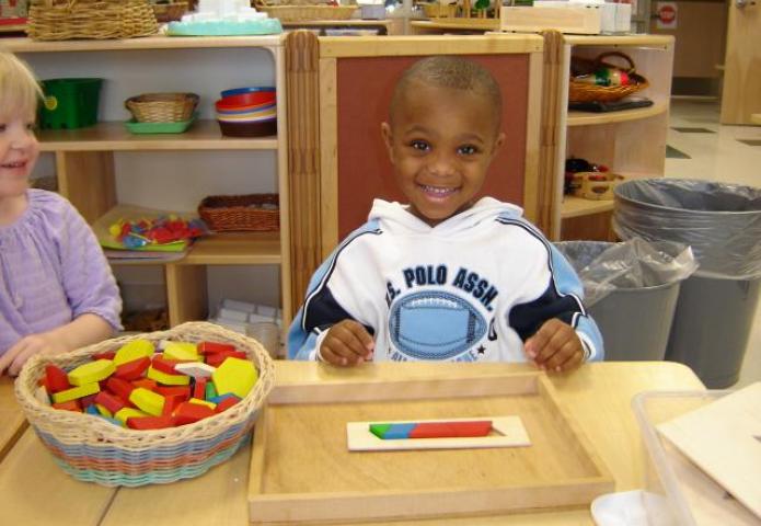 Child playing with shapes.