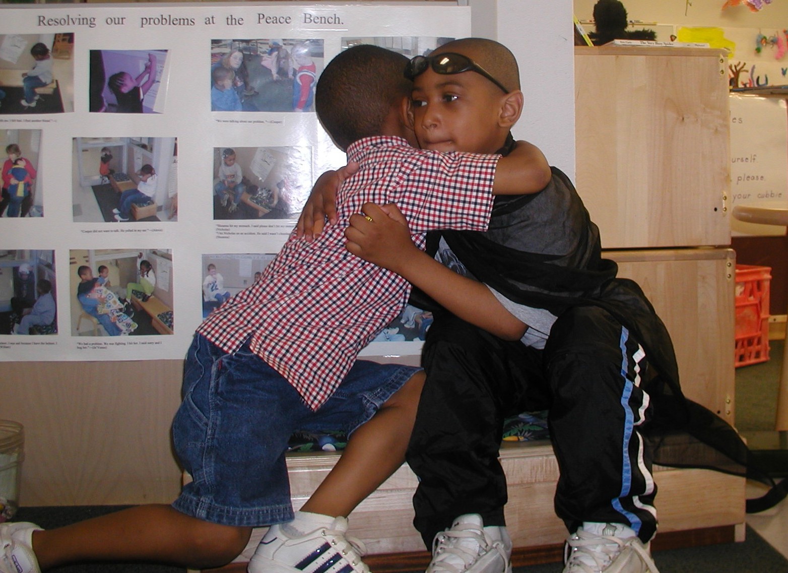 Two boys hugging