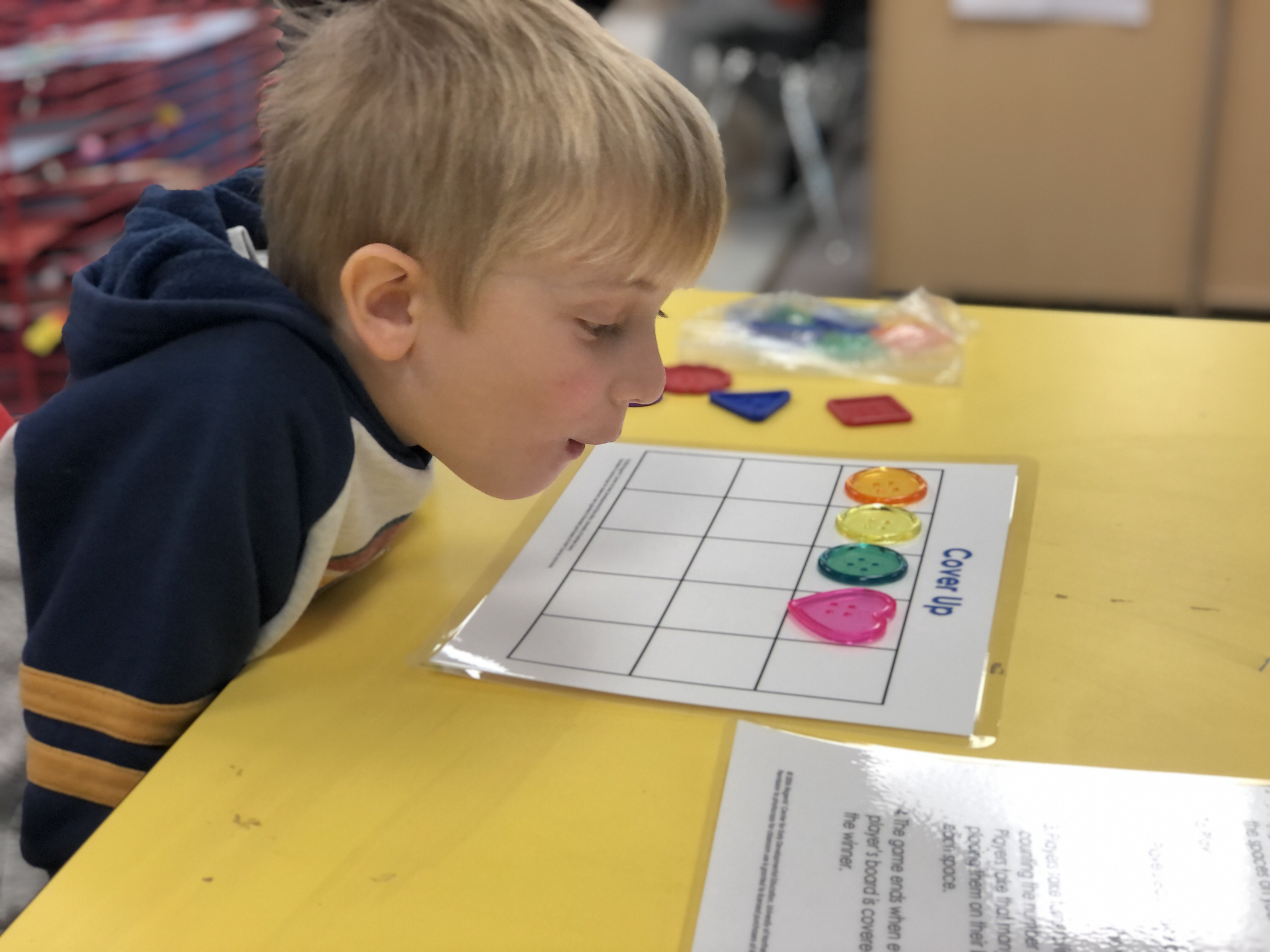 Child looking at a game