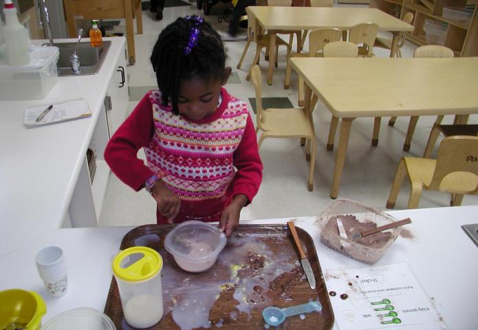 Child mixing ingredients in a bowl