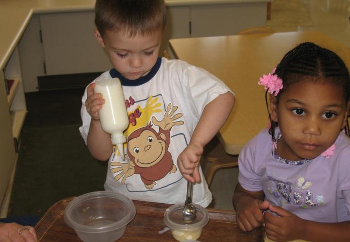 Child mixing ingredients in a bowl