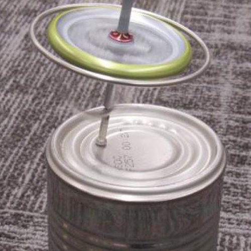 gyroscope spinning on top of a tin can
