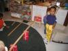 Children in K-2 classroom playing with ramps
